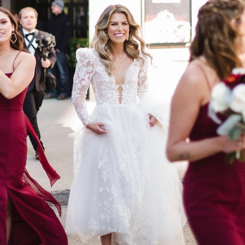 Bride's joy is luminous against her airbrush tan from Glamour Girl, outside a Chicago wedding venue.