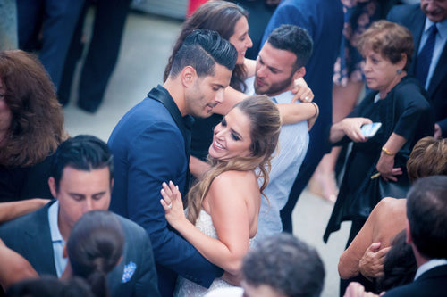 Wedding reception fun moment, guests with Glamour Girl makeup