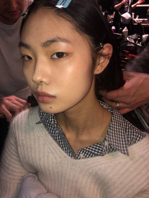 Editorial makeup look by Glamour Girl Airbrush Tan on a model at NYFW.